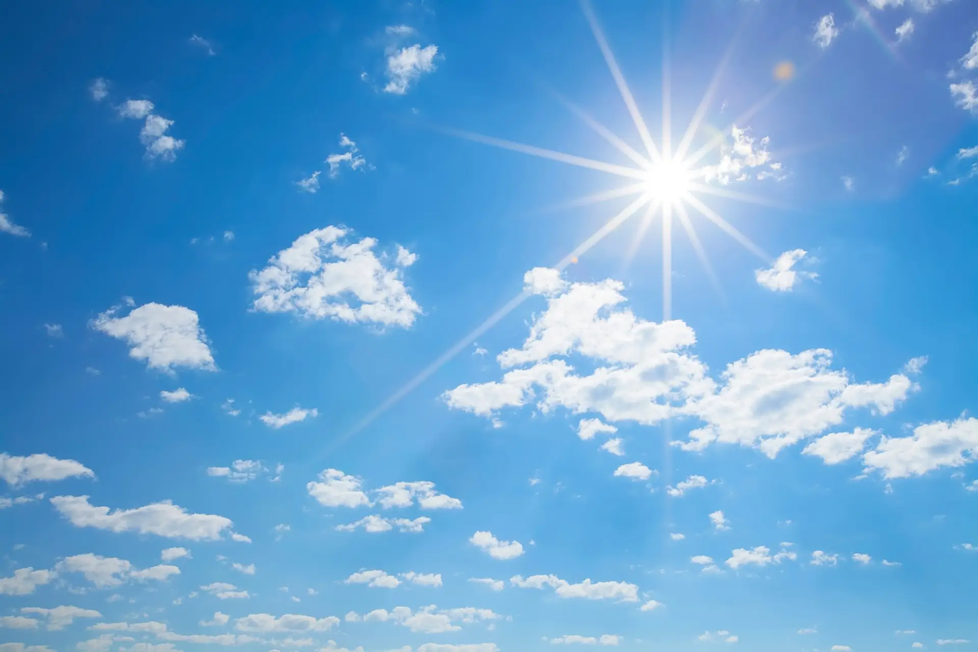 The sun in blue sky where heat awareness is needed for compliance.