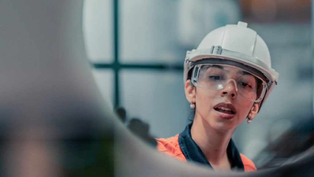 Focused observation during a site walk-through, indicative of diligent field-level risk assessment and adherence to safety protocols, which will be reported into FlexManager compliance software.