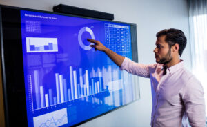 Interactive display with business intelligence visualizations, enabling data-driven decisions for enhanced safety compliance.