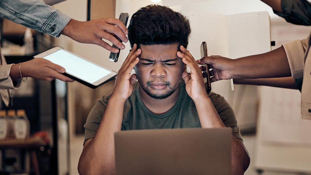 Working professional showing signs of work related stress resulting in chronic illness