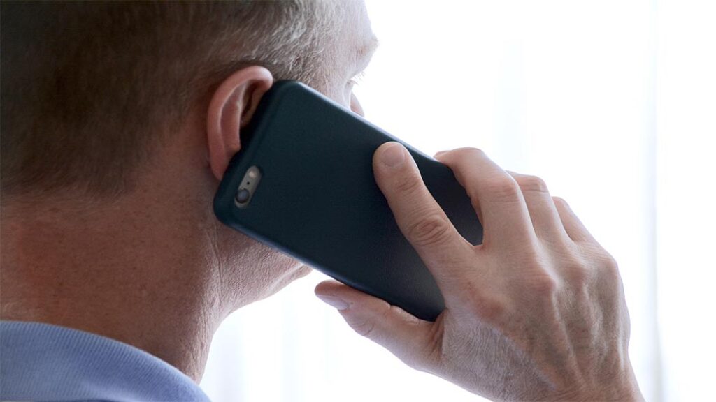 A customer providing feedback regarding a product via phone call.