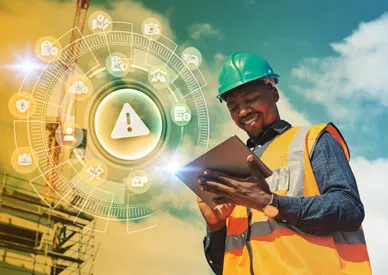 HSEQ Professional using FlexManager Health & Safety Solutions, a comprehensive platform for protecting teams, reducing incident rates, simplifying compliance, and enhancing operational efficiency through real-time risk assessment and reporting.