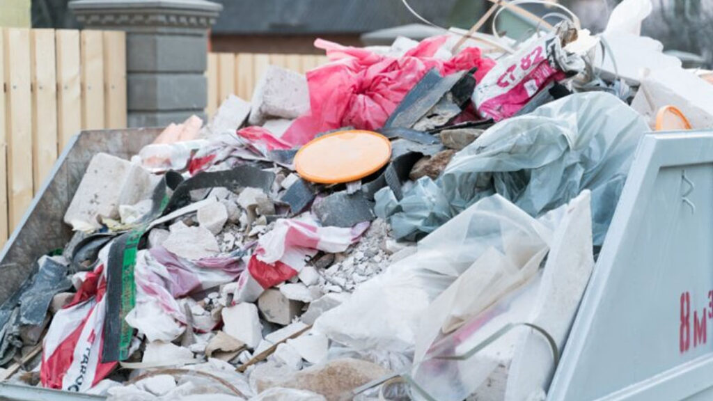 Waste accumulatng in a pile disregarding the permit details