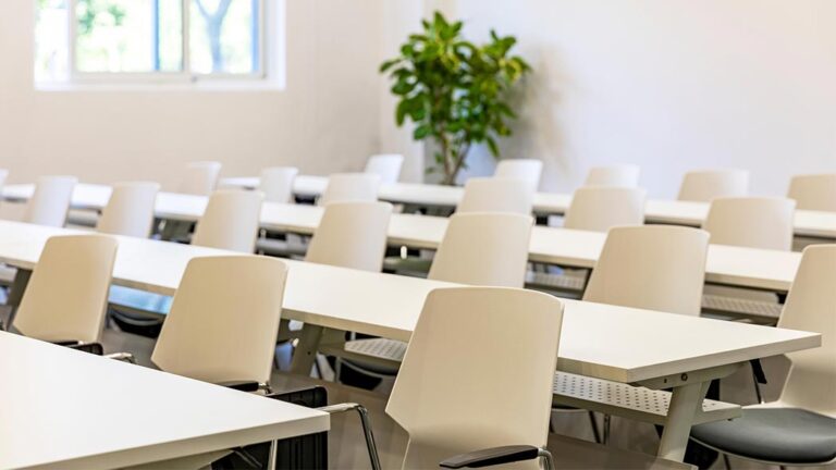 Training room with empty seats that suggest a lack of attendance to critical HSE information sessions.