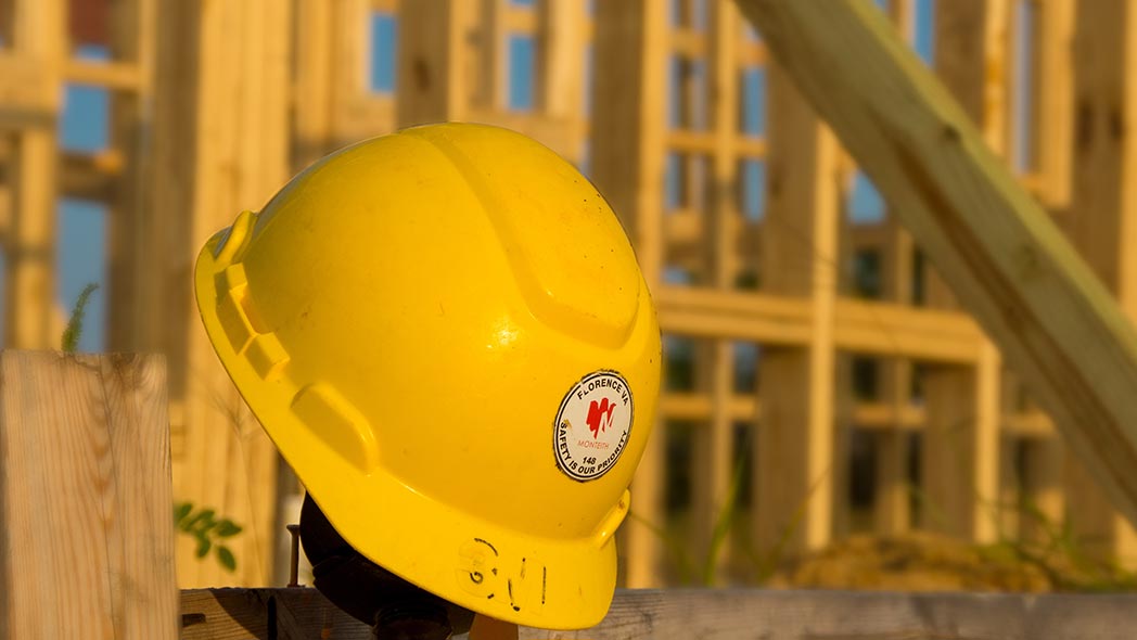 A helmet on a construction site, representing the safety aspect that will be discussed by Ontario Labour Minister.