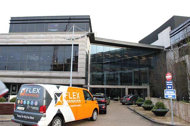 FlexManager vehicle parked in front of SSC building where they will be visiting clients on site.