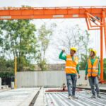 Height-safety is proving to be a critical skills gap in the UK market, reflected by two workers examining a site.