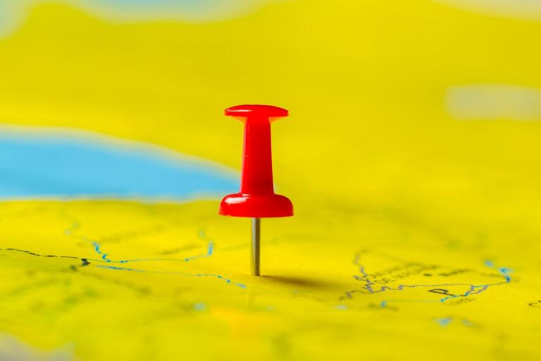 Geolocation represented by a pin on a map.