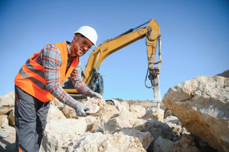 Quarry worker abiding by new health and safety regulations as enacted for 2026.