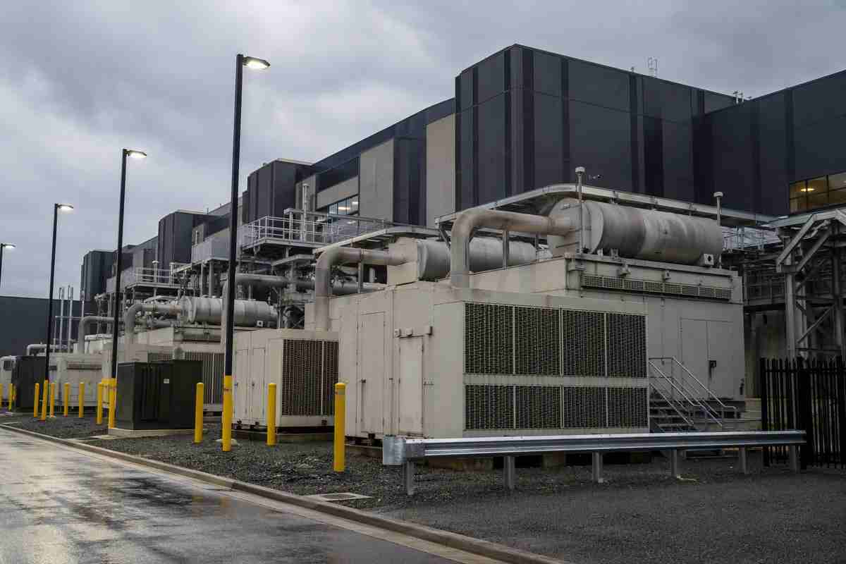 Data centre exterior with emergency generators running, representing the emissions penalty issued against a Microsoft facility in Virginia.