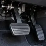Car brake pedal assembly, representing the defect behind BYD's recall of 183,000 vehicles