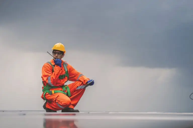 A worker engages in a risk assessment on the job