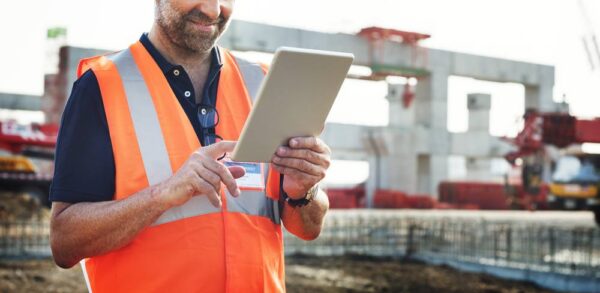 A construction worker embraces Lean project work